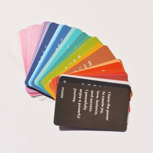Set of colorful affirmation cards on a white background